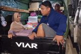 Warga Kampung Muka Ancol mudik naik motor gerobak roda tiga