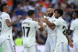 Tiga gol Karim Benzema antarkan Real Madrid menang 4-2 atas Almeria