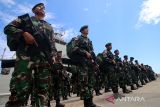 Prajurit Yonif Raider Khusus meneriakkan yel-yel usai upacara penyambutan kepulangan Satgas Pengamanan Perbatasan Papua Nugini di Pelabuhan Krueng Geukuh, Aceh Utara, Aceh, Rabu (24/5/2023). Sebanyak 399 personel prajurit TNI AD dari Bataliyon Raider Khusus 113/Jaya Sakti, Bireuen, tiba kembali di Aceh setelah bertugas dalam pengamanan perbatasan RI-Papua Nugini selama 15 bulan. ANTARA/Rahmad