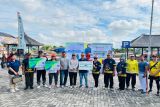 BPJAMSOSTEK-RS Siloam Palangka Raya serahkan perlindungan bagi warga Langkai