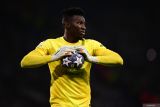 Kiper asal Kamerun Andre Onana dikabarkan gabung Manchester United pekan ini