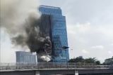 Gedung perkantoran K-Link di Jakarta Selatan terbakar