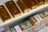 Harga emas naik seiring indeks dolar