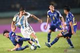 Argentina  dengan susah payah kalahkan Jepang