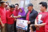 Pemkab Lampung Selatan dan BBPJ Bakauheni serahkan bantuan beda rumah