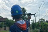 PLN menggunakan teknologi drone untuk inspeksi jaringan