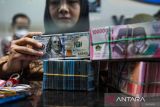 Rupiah Kamis pagi menguat menjadi Rp15.665 per dolar AS