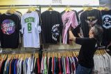 Membeli status berkelas dari baju bekas