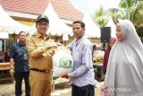 24.9 Ton beras disalurkan bagi 833 Keluarga Penerima Manfaat di Sangir Balai Janggo