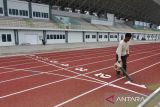 Foto suasana kompleks Stadion Madya Atletik Sumut Sport Center yang akan digunakan untuk Pekan Olahraga Nasional (PON) XXI Aceh-Sumut di Batang Kuis, Deli Serdang, Sumatera Utara, Sabtu (15/6/2024). Stadion yang mampu menampung 2.507 penonton tersebut sudah mencapai 100 persen dan siap digunakan pada PON XXI Aceh-Sumut 2024. ANTARA FOTO/Fransisco Carolio