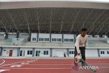 Foto suasana kompleks Stadion Madya Atletik Sumut Sport Center yang akan digunakan untuk Pekan Olahraga Nasional (PON) XXI Aceh-Sumut di Batang Kuis, Deli Serdang, Sumatera Utara, Sabtu (15/6/2024). Stadion yang mampu menampung 2.507 penonton tersebut sudah mencapai 100 persen dan siap digunakan pada PON XXI Aceh-Sumut 2024. ANTARA FOTO/Fransisco Carolio