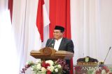 Bupati Tanah Bumbu Provinsi Kalimantan Selatan H. Zairullah Azhar saat membacakan sambutan Menteri Dalam Negeri Muhammad Tito Karnavian dalam acara pelantikan anggota DPRD Tanah Bumbu Kalimantan Selatan Senin (26/8/2024)