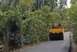 Pemkab Pesisir Selatan aspal ruas jalan Koto Baru-Koto Panjang Ranah Pesisir