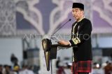 Presiden Joko Widodo menyampaikan sambutan saat membuka Musabaqah Tilawatil Qur'an (MTQ) Nasional ke-30 Tahun 2024 di Stadion Gelora Kadrie Oening, Samarinda, Kalimantan Timur, Minggu (8/9/2024). MTQ Nasional ke-30 yang bertema Mewujudkan Masyarakat Cinta Al-Quran untuk Bangsa yang Bermartabat di Bumi Nusantara itu diikuti 1.998 peserta terdiri dari 1.567 peserta inti dan 431 cadangan dari 35 provinsi yang akan mengikuti delapan cabang perlombaan. ANTARA FOTO/M Risyal Hidayat/nym.