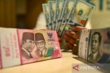 Rupiah menguat karena Sri Mulyani mungkin bergabung ke Kabinet Prabowo