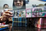 Rupiah dibuka melemah pengaruh ketegangan geopolitik