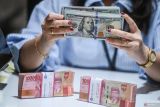 Rupiah menguat dipengaruhi data penjualan ritel China yang lebih baik