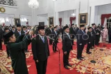 Sejumlah menteri dan kepala badan setingkat menteri dalam Kabinet Merah Putih di Istana Negara, Jakarta, Senin (21/10/2024).  Presiden Prabowo melantik 53 menteri dan kepala badan negara setingkat menteri dalam Kabinet Merah Putih periode 2024-2029. Antara Kaltim/Hafidz Mubarak A/Lmo/nym. 