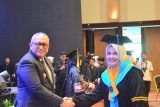 Hadiri Wisuda UT Padang, Pj Wako Andree Algamar Dorong Lulusan Berperan Aktif dalam Masyarakat