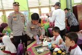 Polres Banyuasin bagikan 400 porsi makanan bergizi ke siswa SD