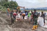 Kodim 1427 Pasangkayu bangun tanggul sungai cegah abrasi