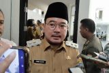 Pemkot  Palembang beri seragam sekolah dan kain kafan gratis