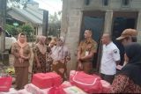 Pemkab Pesisir Selatan salurkan bantuan kepada korban kebakaran di Kampung Lubuk Pandan