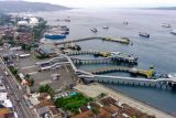 Foto udara suasana Pelabuhan Ketapang di Banyuwangi, Jawa Timur, Jumat (14/3/2025). PT ASDP Indonesia Ferry akan menutup sementara Pelabuhan Ketapang dan Gilimanuk selama Hari Raya Nyepi 2025 yang berbarengan dengan puncak arus mudik lebaran. ANTARA Jatim/Budi Candra Setya/mas.