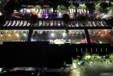 Foto udara suasana di Terminal Purabaya, Bungurasih, Sidoarjo, Jawa Timur, Jumat (28/3/2025). H-3 Menjelang Lebaran 2025 Terminal Bungurasih mencatat sekitar 15 ribu penumpang yang berangkat dibandingkan dengan hari sebelumnya yang hanya 9 ribu penumpang. Antara Jatim/Umarul Faruq