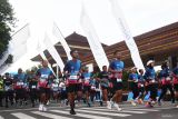 Sejumlah peserta memacu kecepatan saat mengikuti East Java Running Fest 2025 di Kota Madiun, Jawa Timur, Minggu (27/4/2025). Kegiatan olahraga lari dengan jarak tempuh 5KM dan 10KM tersebut diikuti sekitar 1.500 peserta dari berbagai daerah di Indonesia. Antara Jatim/Siswowidodo/um