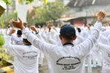 Peserta mengikuti senam bersama dalam rangkaian kegiatan Musyawarah Nasional ke-5 Senam Sehat Indonesia Wai Tan Kung (SSI/WTK) di kawasan Pahlawan Street Center Kota Madiun, Jawa Timur, Senin (12/5/2025). Kegiatan senam bersama tersebut diikuti sekitar 4.000 peserta dari berbagai daerah di Indonesia. Antara Jatim/Siswowidodo/um 