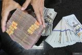 Rupiah menguat seiring kekhawatiran atas kesehatan fiskalAS