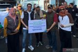 BPJS-TK menyalurkan bantuan Rp99,9 juta untuk korban banjir di Mataram