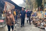 Police's forensics team probes Taman Puring market fire