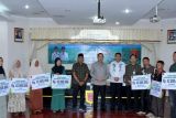 BPJS Ketenagakerjaan serahkan santunan kematian bagi sembilan tenagakerja di Agam