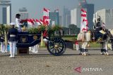 Rombongan kirab bendera sudah bergerak dari Monas ke Istana Merdeka