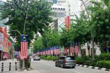 Bendera Malaysia dipasang di jalanan Kuala Lumpur jelang HUT Ke-68 Malaysia