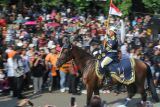 Prajurit TNI berkuda siap mengikuti upacara peringatan HUT ke-80 TNI di kawasan Silang Monas, Jakarta, Minggu (5/10/2025). Pada peringatan usianya yang ke-80 ini TNI mengangkat tema besar TNI Prima, TNI Rakyat, Indonesia Maju. ANTARA FOTO/Asprilla Dwi Adha/wsj.