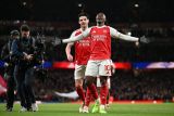 Arsenal kini hanya unggul lima poin atas City