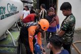 Dompet Dhuafa Waspada salurkan 10.000 liter air bersih bagi korban banjir Sumatera