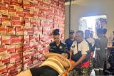 Indonesian navy hospital ship treats flood victims in North Sumatra