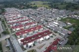 Foto udara deretan unit rumah subsidi di Rajeg, Kabupaten Tangerang, Banten, Rabu (7/1/2026). Badan Pengelola Tabungan Perumahan Rakyat (BP Tapera) mengungkapkan penyaluran dana Fasilitas Likuiditas Pembiayaan Perumahan (FLPP) rumah subsidi pada 2025 mencapai 278.868 unit senilai Rp34,64 triliun dari 40 bank penyalur pada 13.249 perumahan di 33 provinsi dan 401 kabupaten/kota. ANTARA FOTO/Putra M. Akbar/gp