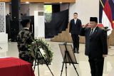 Penghormatan terakhir untuk para korban kecelakaan pesawat