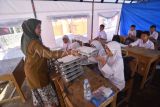 Distribusi MBG di bawah tenda darurat