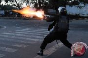 TEMBAKAN GAS AIR MATA