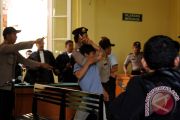 SIDANG PEMBUNUHAN RICUH