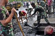 BERSIHKAN DRAINASE