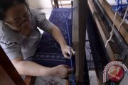 KAIN TENUN PINAWETENGAN