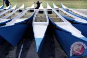 PRODUKSI PERAHU NELAYAN BERBAHAN FIBER