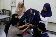 INOVASI JAKET PINTAR